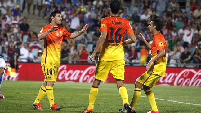 Aqui n&atilde;o! Com dois de Messi, Barcelona goleia o Getafe