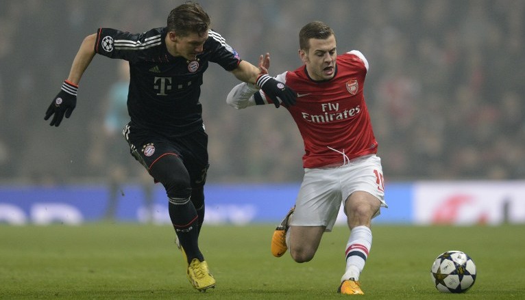 Wilshere se lesiona e est&aacute; fora do duelo contra o Bayern