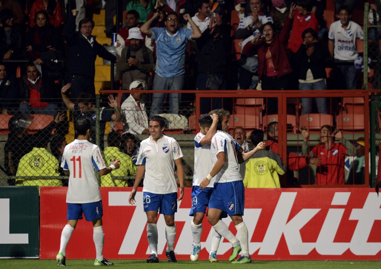 Ivan Alonso comemora o gol da vit&oacute;ria do Nacional contra o Toluca, no M&eacute;xico (Foto: AFP PHOTO/Alfredo Estrella)