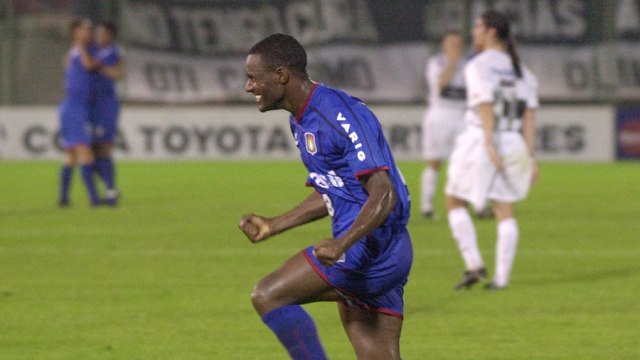 Ailton of Sao Caetano from Brazil celebrates his goal against Olimpia from Paraguay during the first final game of the Libertadores Cup at Defensores del Chaco Stadium in Asuncion, Paraguay on Wednesday, July 24, 2002.(AP Photo/Walter Astrada)