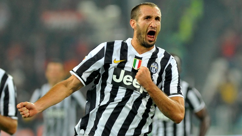 Chiellini comemora gol no cl&aacute;ssico contra o Milan (AP Photo/Massimo Pinca)