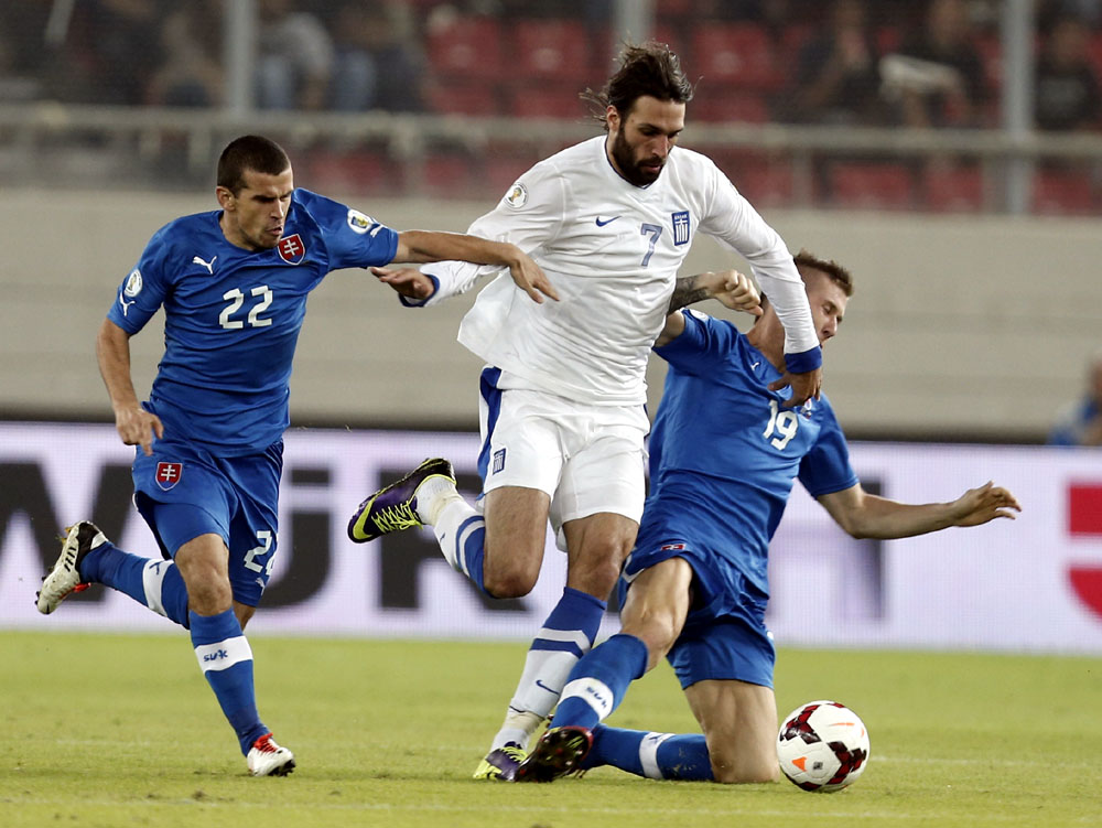 Gr&eacute;cia, de Samaras, disputa vaga direta na Copa, mas vai ao menos para repescagem (AP Photo/Thanassis Stavrakis)