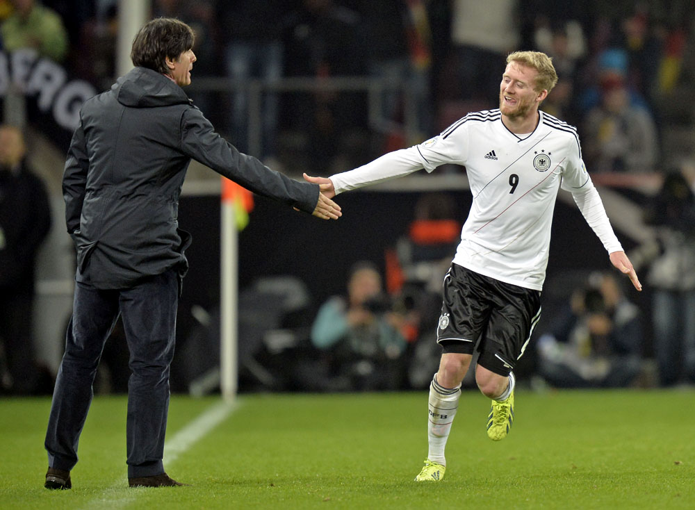 Andr&eacute; Sch&uuml;rrle marcou: a Alemanha est&aacute; na Copa de 2014 (AP Photo/Martin Meissner)