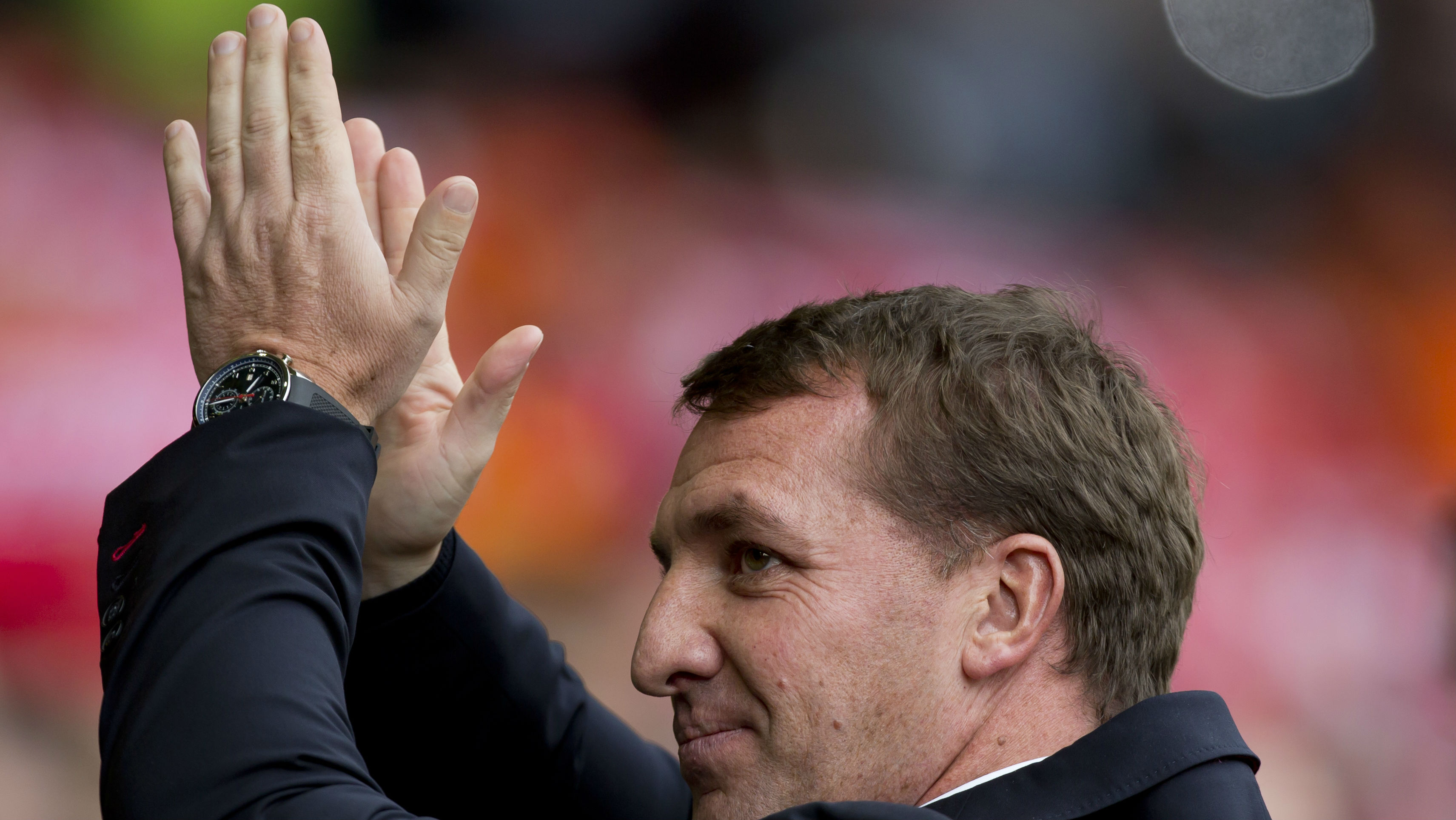 Brendan Rodgers n&atilde;o conseguiu esconder o sorriso durante a goleada sobre o Tottenham (Foto: AP)