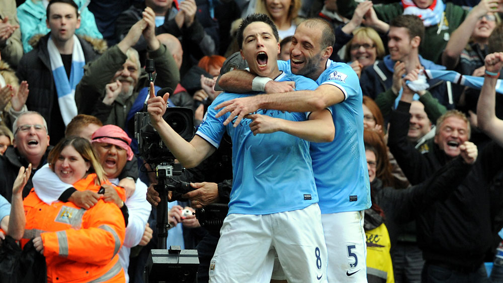 Nasri e Zabaleta, do Manchester City (AP Photo/Rui Vieira)