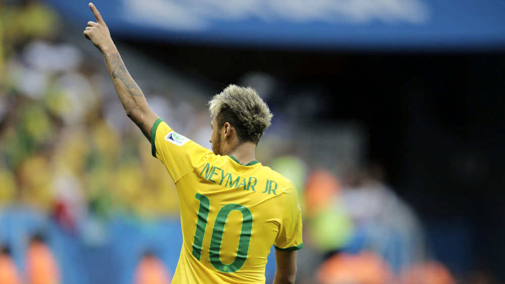 Neymar comemora: decisivo para o Brasil (AP Photo/Bernat Armangue)