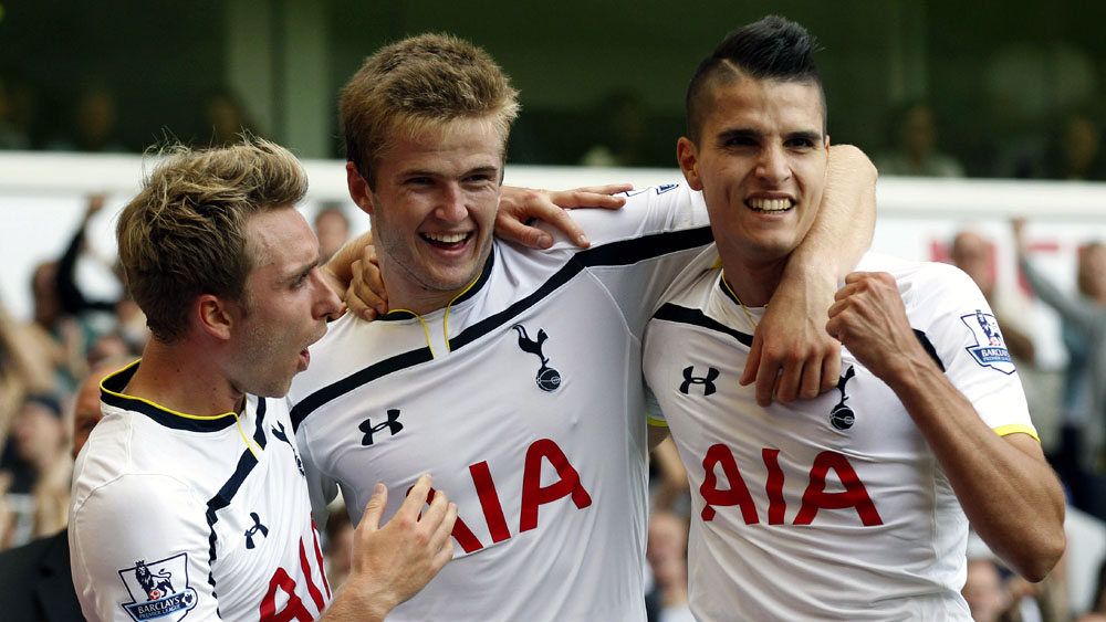 Eriksen (esq.), Dier e Lamela comemoram: Tottenham goleou (AP Photo/Sang Tan)