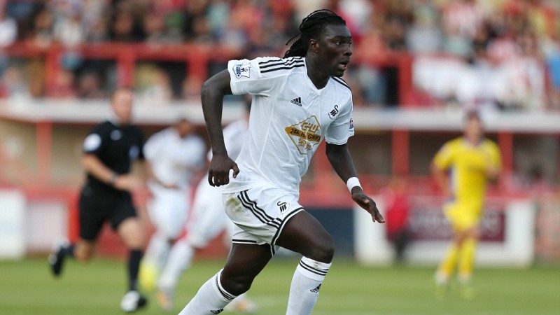 Como Gomis conheceu o Swansea antes de se transferir? Jogando FM