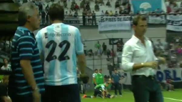 Milito n&atilde;o gostou muito de ser substitu&iacute;do na partida que o Racing virou l&iacute;der