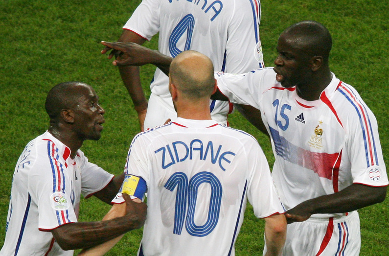 French midfielder Zinedine Zidane(C) celebrates with his teammates Lilian Thuram(R) and Claude Makelele after scoring a penalty during the World Cup 2006 semi final football game Portugal vs. France, 05 July 2006 at Munich stadium. AFP PHOTO  PATRIK STOLLARZ