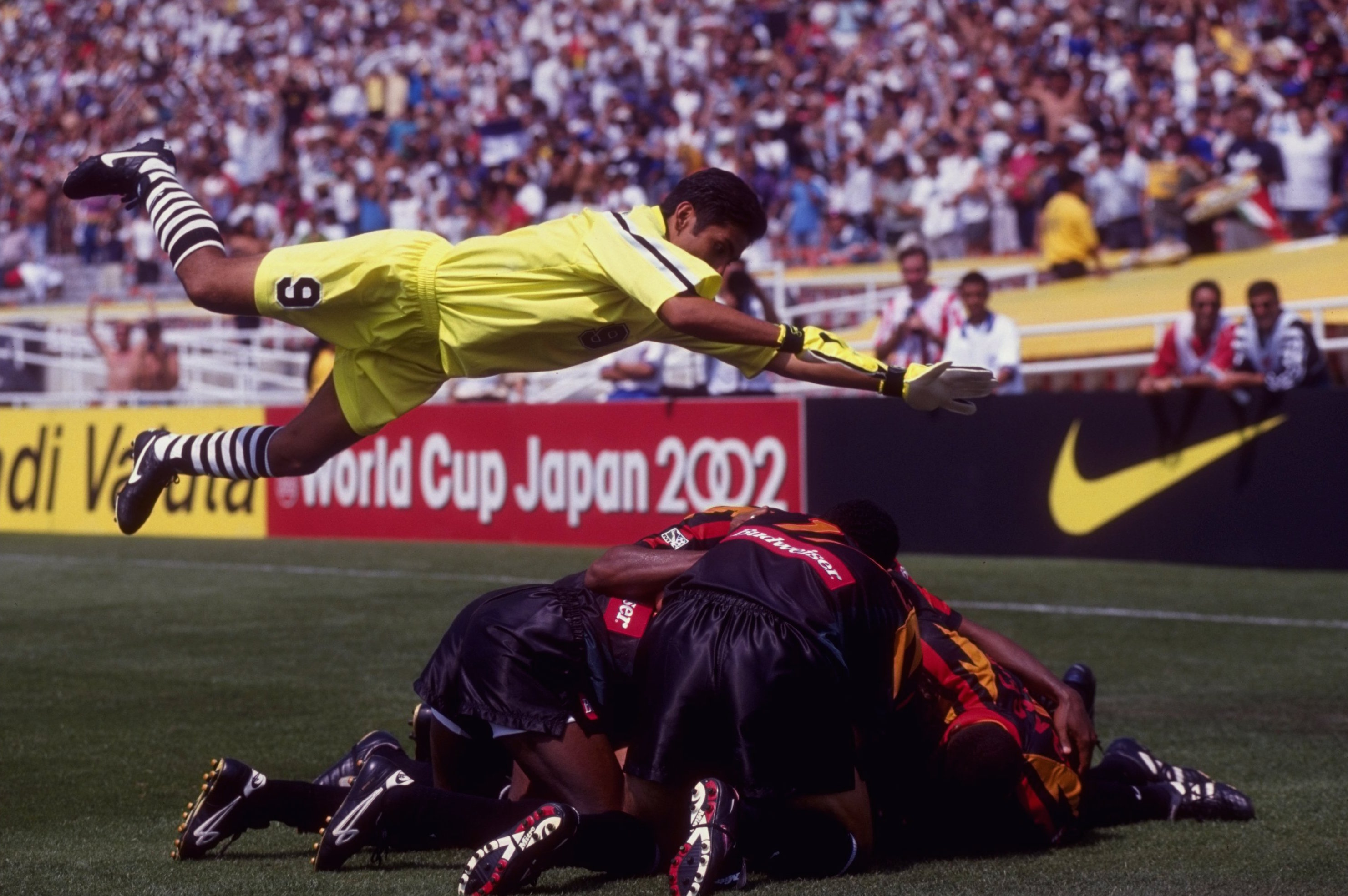 5 MAY 1996: Jorge Campos #9 of the Los Angeles Galaxy celebrates the third goal scored by teammate Jorge Salcedo #5 during an MLS game against DC United played at the Rose Bowl in Pasadena, California. The Galaxy won the game, 3-1. Mandatory Credit: Stev