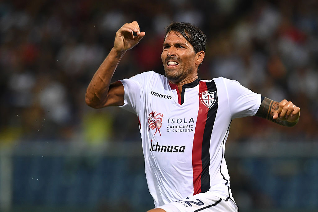 GENOA, ITALY - AUGUST 21:  Marco Borriello of Cagliari Calcio celebrates after scoring the opening goal during the Serie A match between Genoa CFC and Cagliari Calcio at Stadio Luigi Ferraris on August 21, 2016 in Genoa, Italy.  (Photo by Valerio Pennicino/Getty Images)