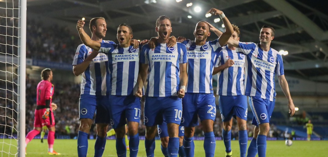 Brighton & Hove Albion's centre forward Tomer Hemed (10) takes a penalty and scores a goal 3-0 and celebrates, celebrating during the EFL Sky Bet Championship match between Brighton and Hove Albion and Rotherham United at the American Express Community Stadium, Brighton and Hove, England on 16 August 2016.