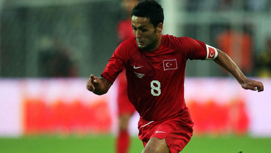 DORTMUND, GERMANY - JUNE 05: Yildiray Bastuerk runs with the ball during the International Friendly match between Brazil and Turkey at the Signal Iduna Park on June 5, 2007 in Dortmund, Germany. (Photo by Lars Baron/Bongarts/Getty Images)
