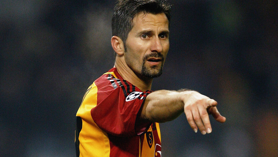 ISTANBUL, TURKEY - DECEMBER 05: Ergun Penbe of Galatasaray in action during the UEFA Champions League group C match between Galatasaray and Liverpool at the Ataturk stadium on December 5, 2006 in Istanbul, Turkey (Photo by Mark Thompson/Getty Images) *** Local Caption *** Ergun Penbe