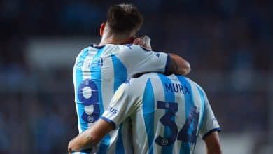 Insanidade pura: O Racing tomou o empate do Aucas e buscou a vit&oacute;ria com um a menos, gra&ccedil;as a um gol contra bisonho