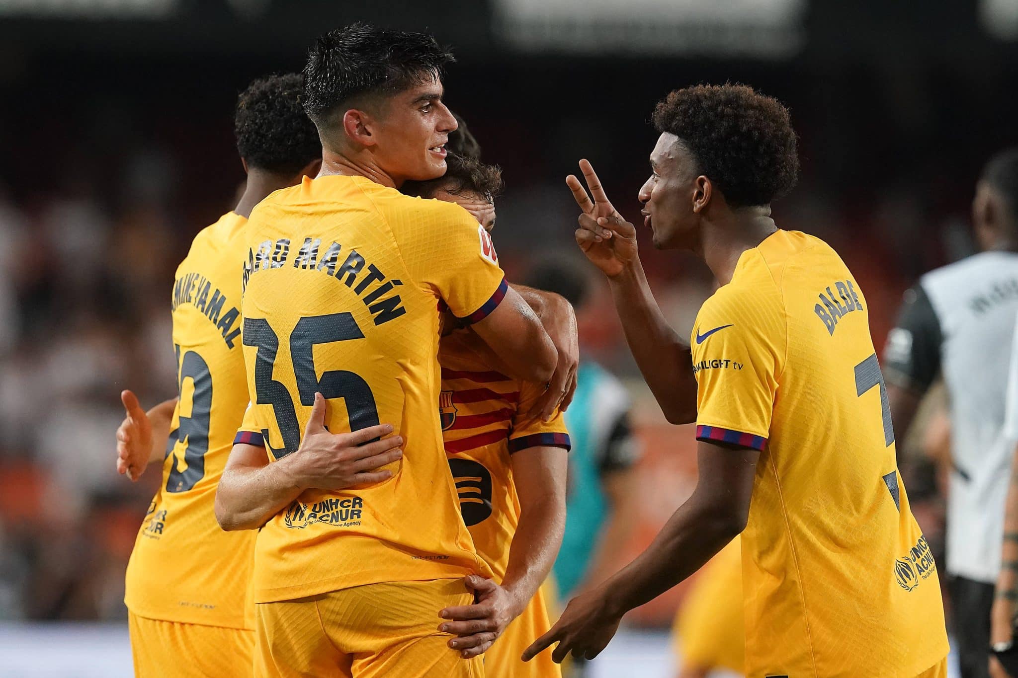 Lamine Yamal, Marc Casad&oacute;, Gerard Martin e Alejandro Balde, todos da base do Barcelona, durante jogo de La Liga