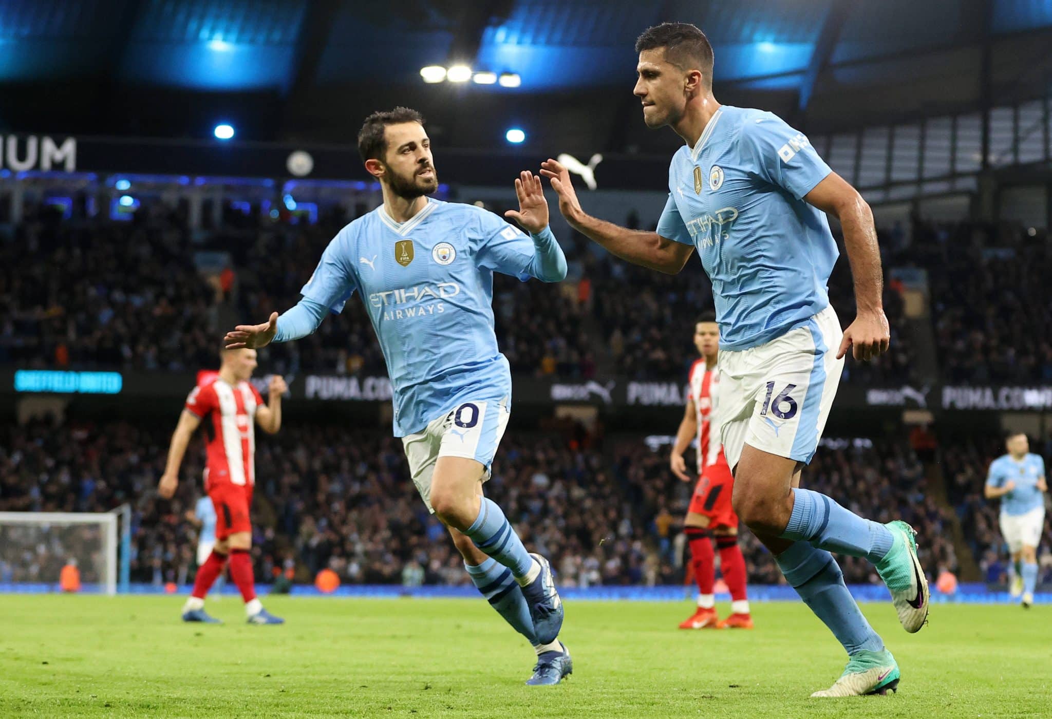 Rodri e Bernardo Silva juntos pelo Manchester City. Foto: Imago