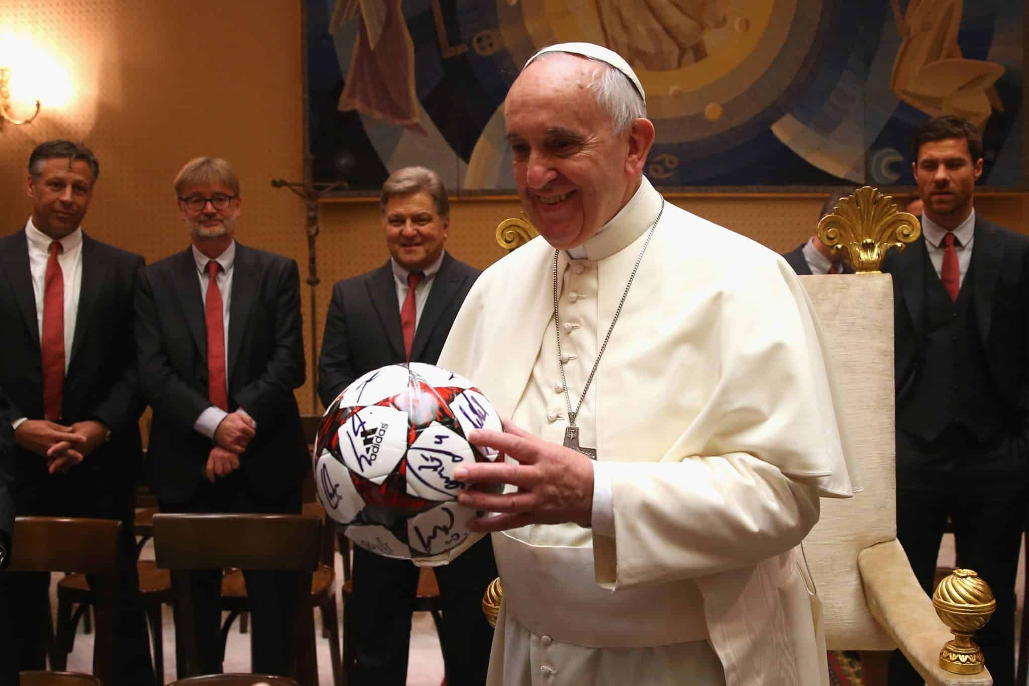 VATICAN CITY VATICAN OCTOBER 22 Pope Francis holds a gift of FC Bayern Muenchen during an privat