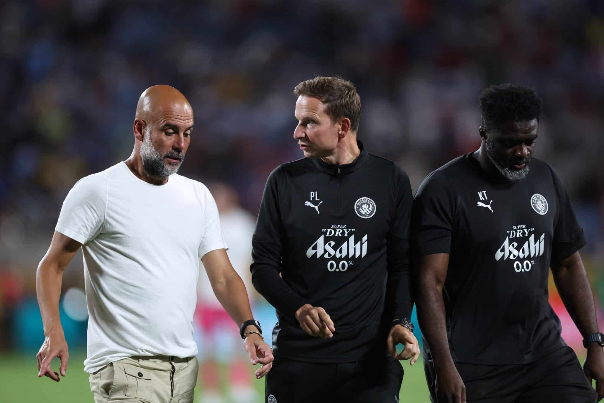 Guardiola e os auxilias Pep Lijnders e Kolo Tour&eacute;