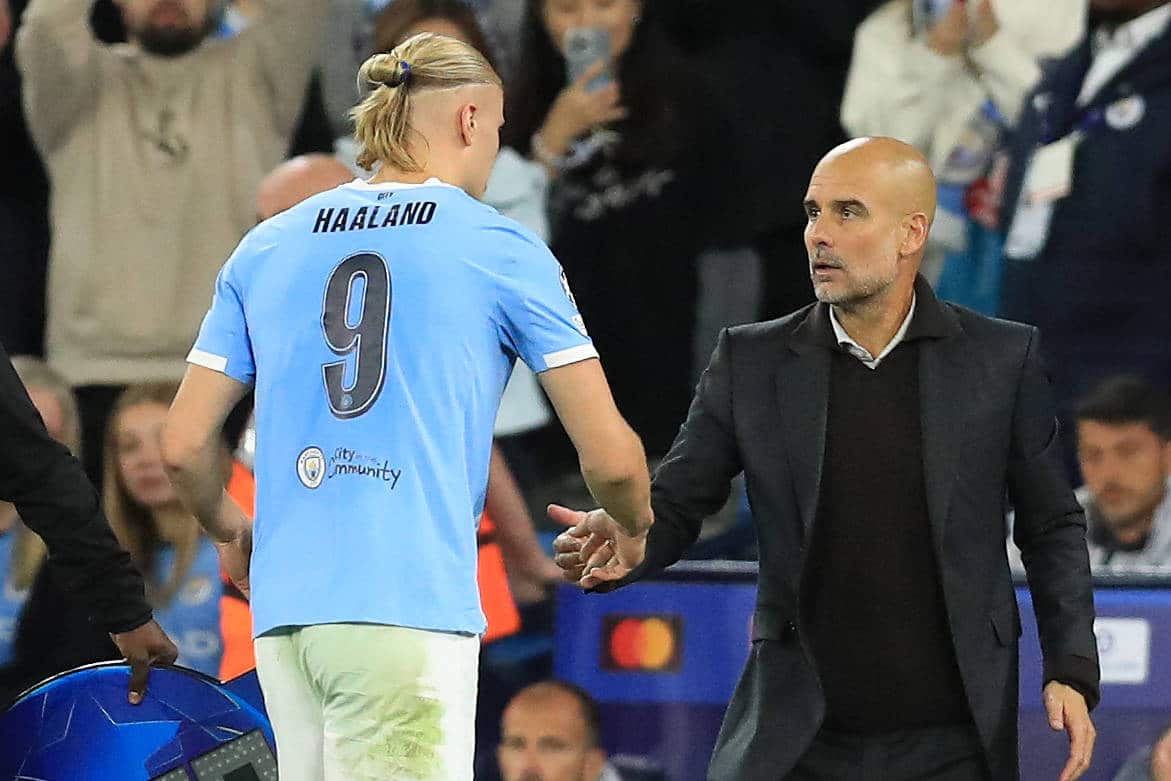 Erling Haaland e Pep Guardiola em jogo do Manchester City