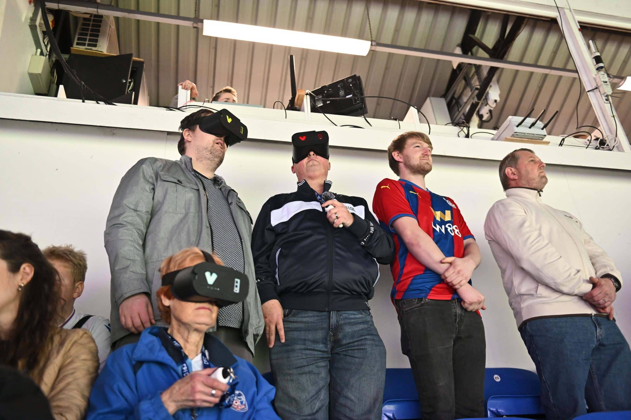 Torcedores usando GiveVision